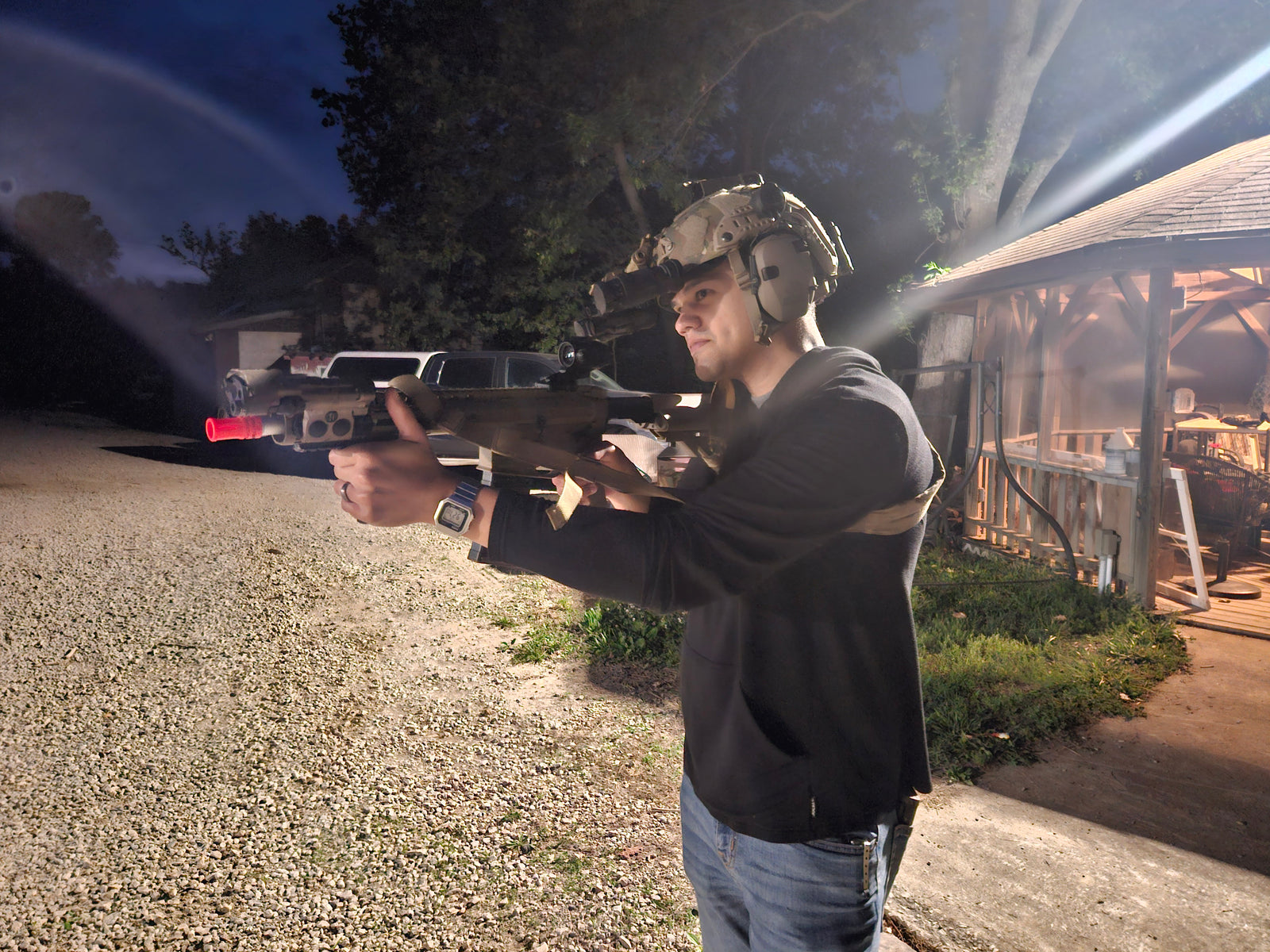 A person using an Airsoft Gas blowback gun for realistic firearm training